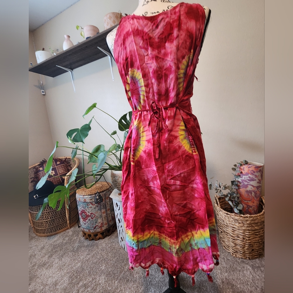 Vintage tie dye dress with adjustable tie in back. Rouched straps and fringe det